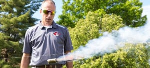 Professor Tom Spudich conducts a chemistry experiment with rockets